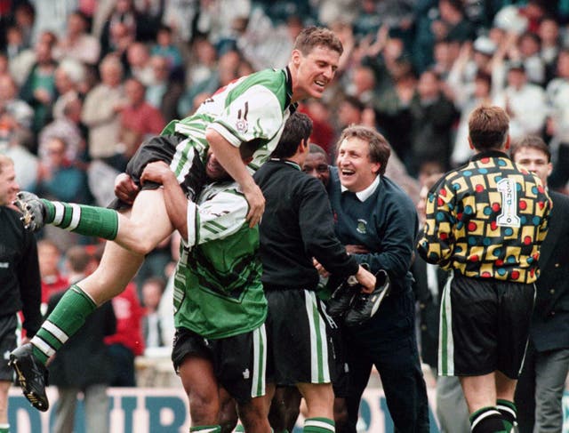 Neil Warnock, second right, celebrates with his Plymouth players at Wembley after winning promotion to the old Second Division via the play-offs in 1996