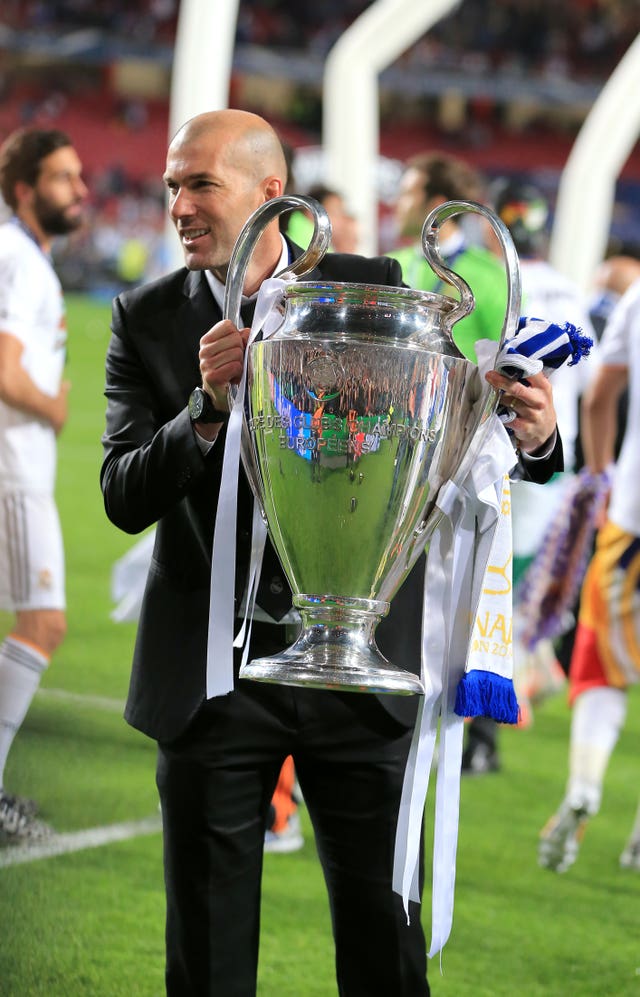 Zinedine Zidane with the Champions League trophy