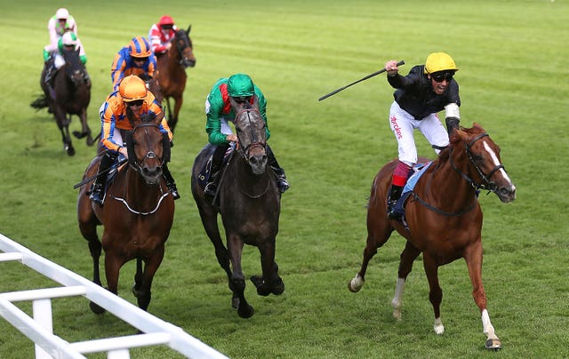 Frankie Dettori celebrates winning the Ascot Gold Cup on Stradivarius