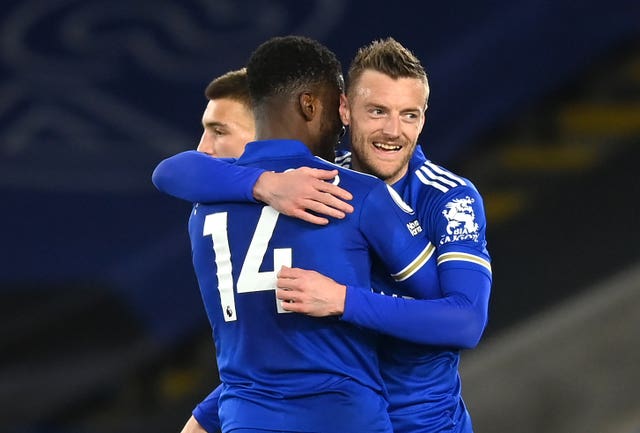 Leicester City's Kelechi Iheanacho (left) celebrates with with team-mate Jamie Vardy (right) 