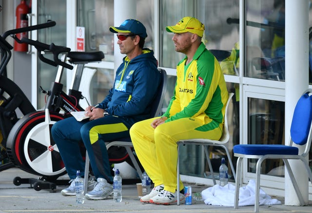 Aaron Finch, right, suggested criticism of Justin Langer, left, is a storm in a teacup (Dan Mullan/PA)