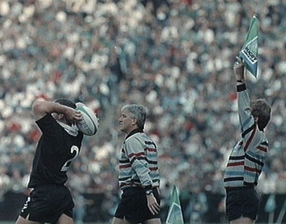 Referee Ed. Morrison supervises a line out