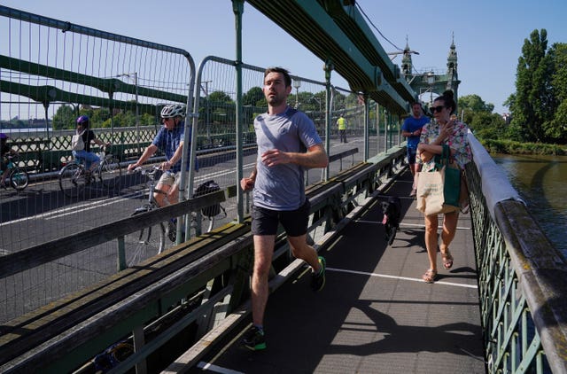 Cyclists and pedestrians on Hammersmith Bridge