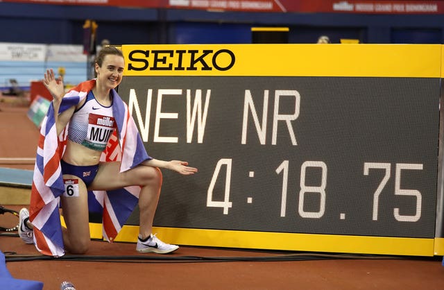 Laura Muir celebrates after shattering the British mile record at the Muller Indoor Grand Prix