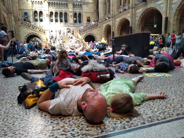 Protesters staging a die-in at the Natural History Museum