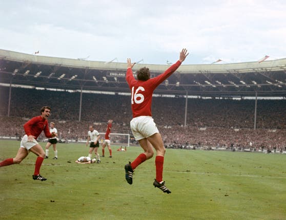 Sir Geoff Hurst (left) did not make his England debut until February 1966.