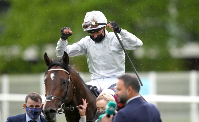 Frankie Dettori celebrates winning the Lockinge on Palace Pier