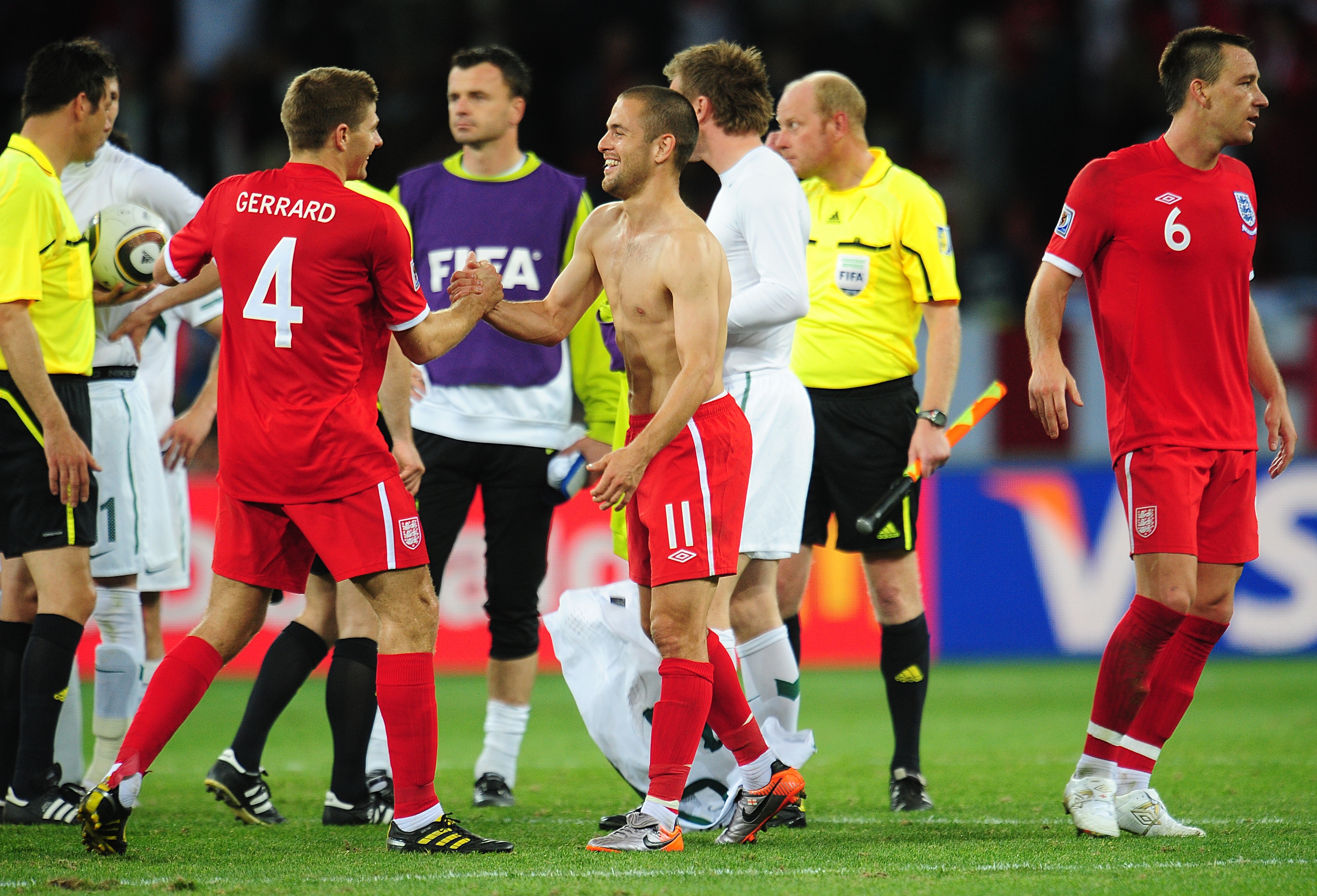 Steven Gerrard left and Joe Cole centre