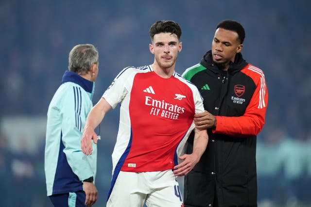 Arsenal’s Declan Rice is consoled by team-mate Gabrie
