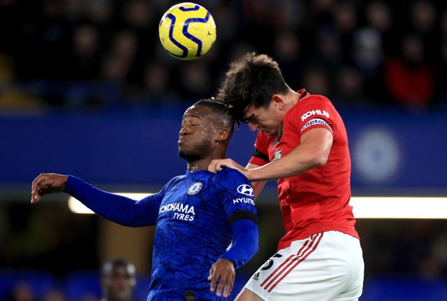 Harry Maguire, right, and Michy Batshuayi