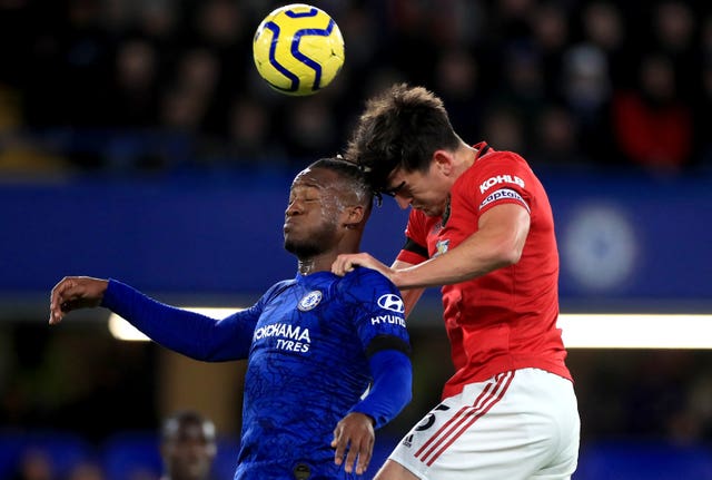 Harry Maguire, right, and Michy Batshuayi