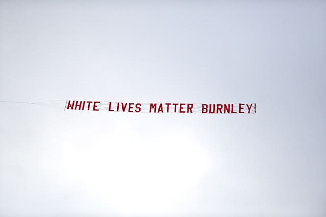 A plane with a White Lives Matter Burnley banner was flown over the Etihad Stadium before the Manchester City v Burnley Premier League match on June 22