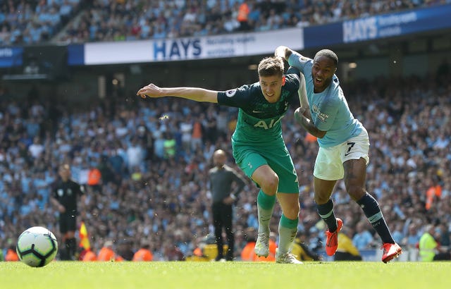 Raheem Sterling, right, tussles with Juan Foyth