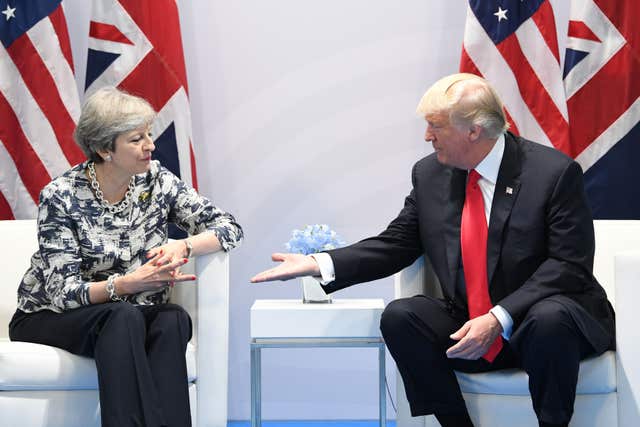 File photo dated 08/07/17 of Prime Minister Theresa May holding talks with US President Donald Trump 