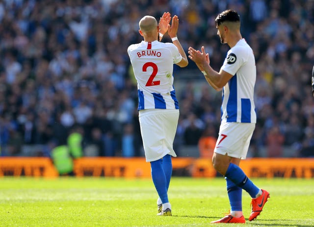 Brighton full-back Bruno salutes the crowd on his final appearance for the club