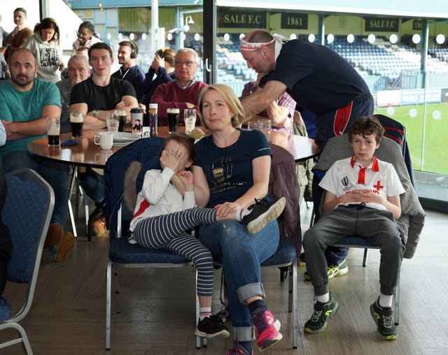 England fans watch the match at Sale Rugby Club