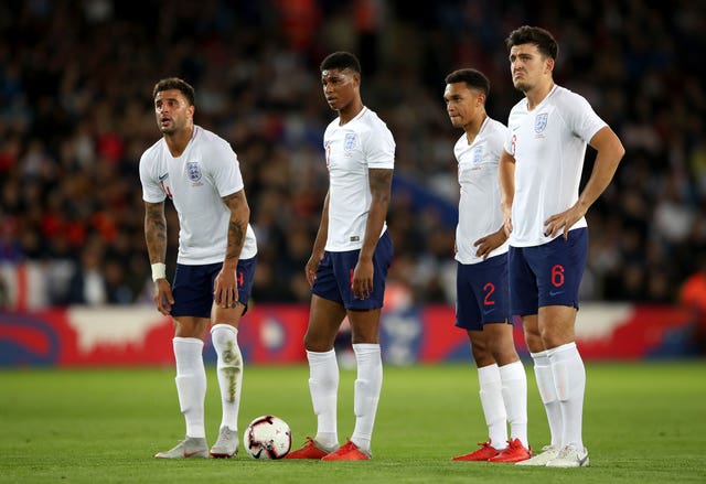 England players get ready for a set piece. (PA)