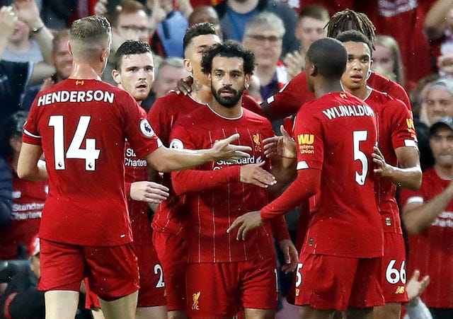 Mohamed Salah, centre, was among the goals as Liverpool began the season with a 4-1 win against Norwich
