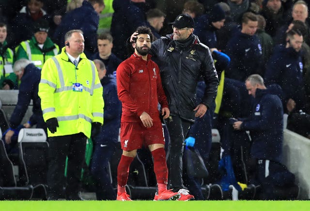 Jurgen Klopp, right, and Mohamed Salah are posing a problem for Manchester City in the title race