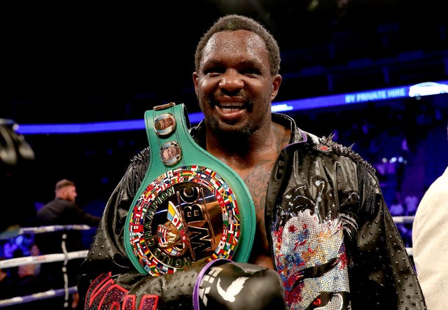 Dillian Whyte was also celebrating after defeating Oscar Rivas on points in the WBC interim heavyweight title fight in London