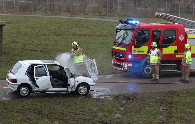 Staff simulated a car fire inside the lion enclosure to test the response of animal handlers and the fire service (Andrew Milligan/PA)