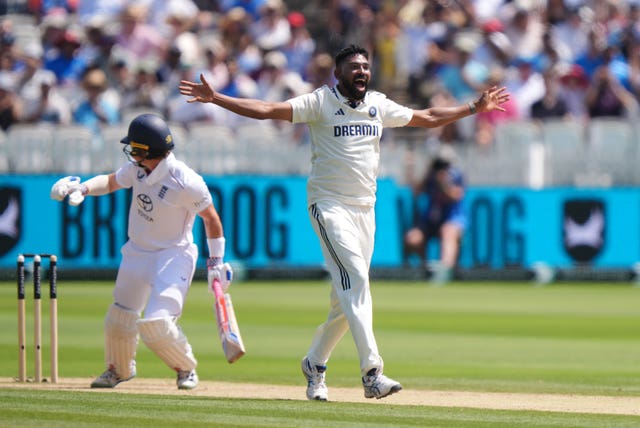 Mohammed Siraj celebrates after snaring Ollie Pope lbw