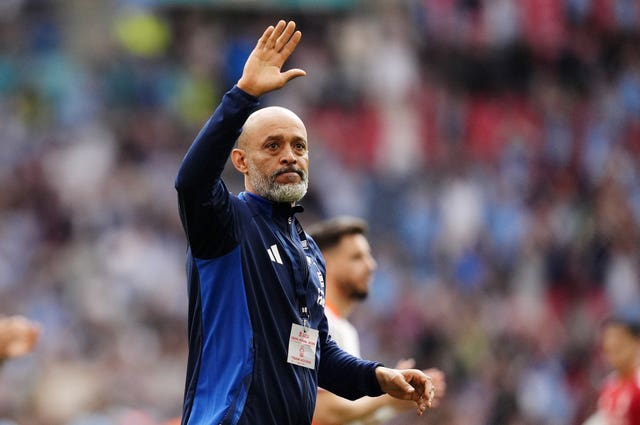 Nuno Espirito Santo gestures to fans