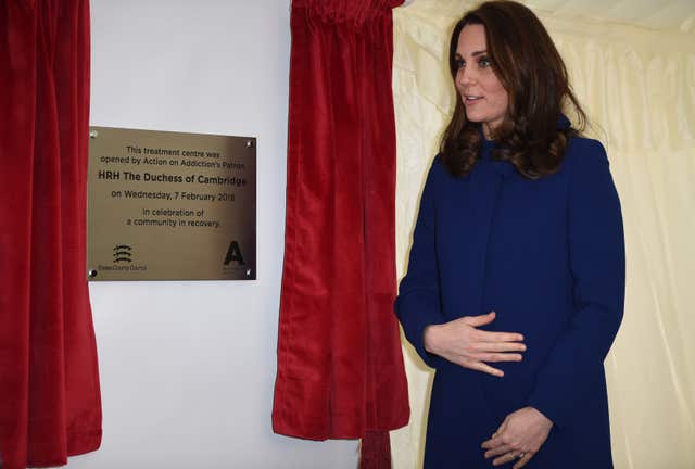 Kate unveils a plaque to officially open the centre (Eddie Mulholland/Daily Telegraph/PA)