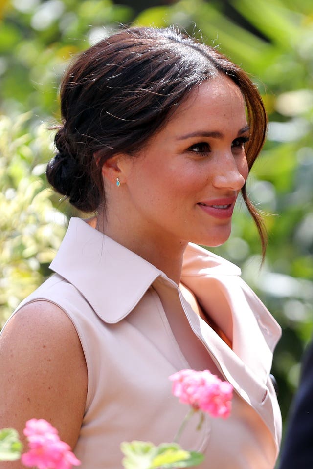 The Duchess of Sussex during a visit to Graca Machel, widow of the late Nelson Mandela, on the last day of their tour in Africa.
