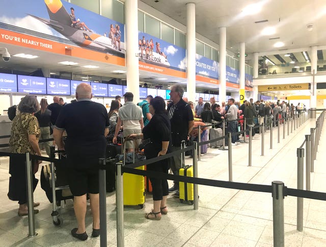 Passengers at Gatwick Airport on Friday
