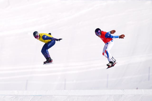 Huw Nightingale (left) during the mixed team snowboard cross