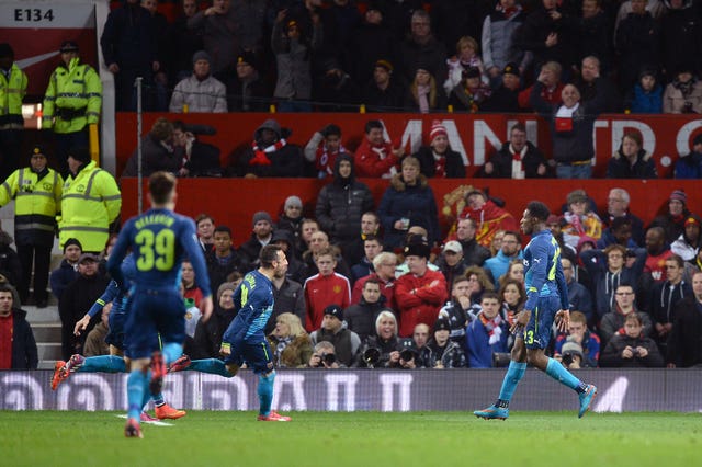 Arsenal's Danny Welbeck (right) celebrates after scoring on his return to Old Trafford. (PA)
