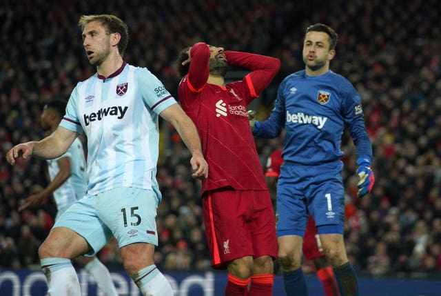 Liverpool close gap on Manchester City after edging past West Ham