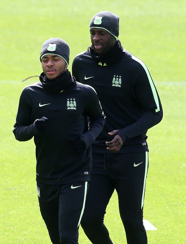 Yaya Toure (back) is fully behind Raheem Sterling (front).