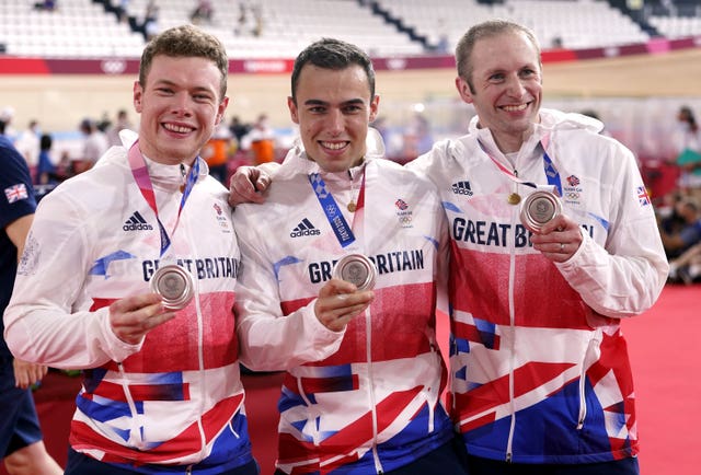 Jack Carlin, Ryan Owens and Jason Kenny pose with their silver medals
