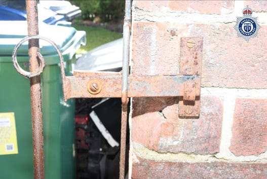 The mechanism on the gate to the patio where the dog Toretto had been kept at Garner’s home in Bardsley Avenue