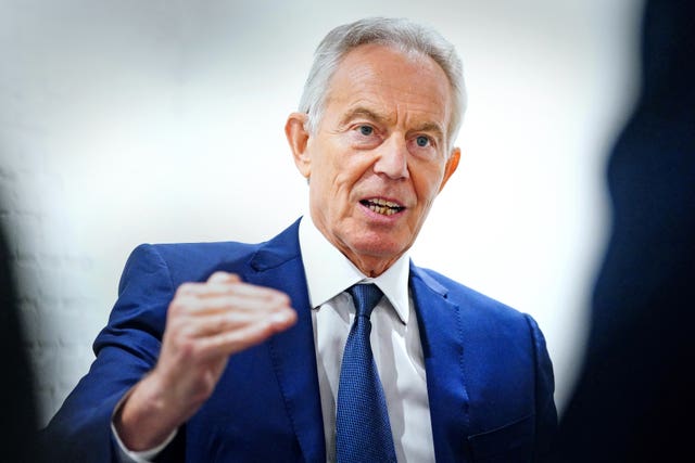 Sir Tony Blair speaks to journalists