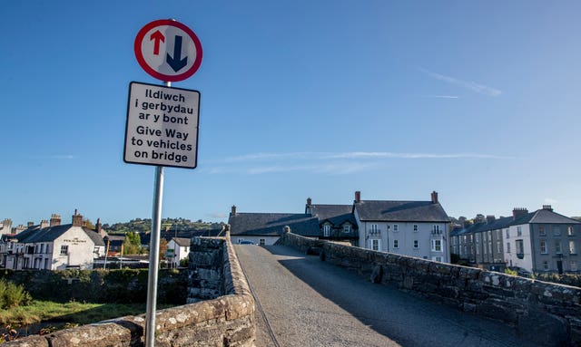 Scenic view ruined by road sign