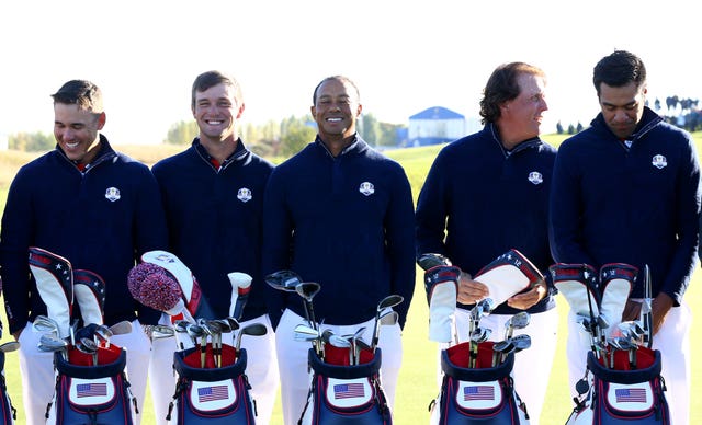 Brooks Koepka (left) and Bryson DeChambeau (second left)