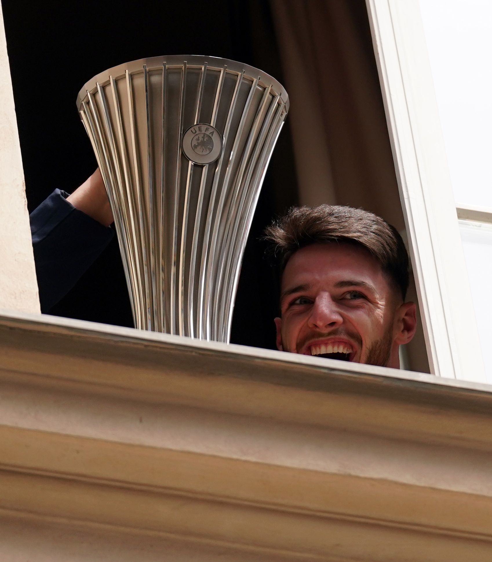 Declan Rice with the Europa Conference League trophy at the West Ham team hotel on Thursday morning