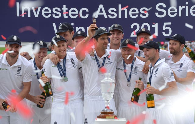 England captain Alastair Cook lifts the Ashes Urn after victory in 2015