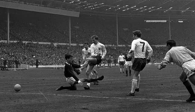 A struggling Jack Charlton nets for the hosts