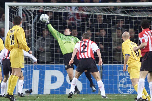 Nigel Martyn makes a save for Leeds in the UEFA Cup against PSV