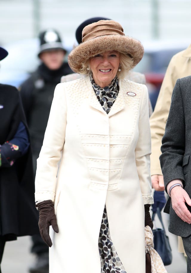 The Duchess of Cornwall arrives ahead of Ladies Day of the 2019 Cheltenham Festival at Cheltenham Racecourse.