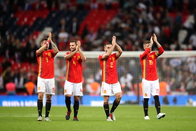 Spain's players applaud the fans after their victory over England