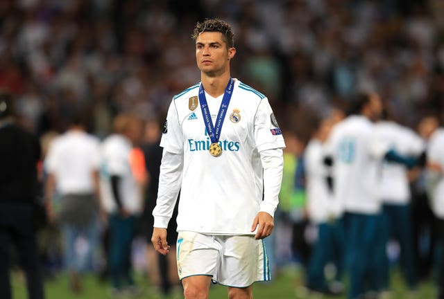 Ronaldo left Real after helping them win a third consecutive Champions League title (Mike Egerton/PA).