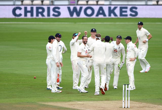 England’s Chris Woakes celebrates the wicket of Pakistan’s Mohammed Rizwan