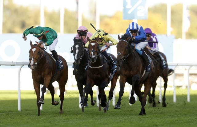 Anmaat (right) challenged wide at Ascot
