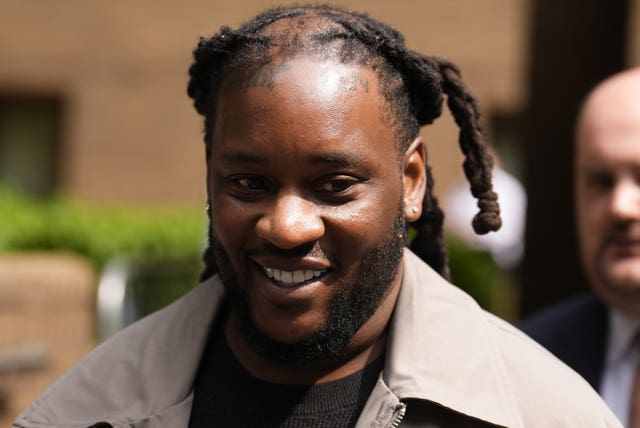 US national Omololu Akinlolu, 38, leaves Southwark Crown Court