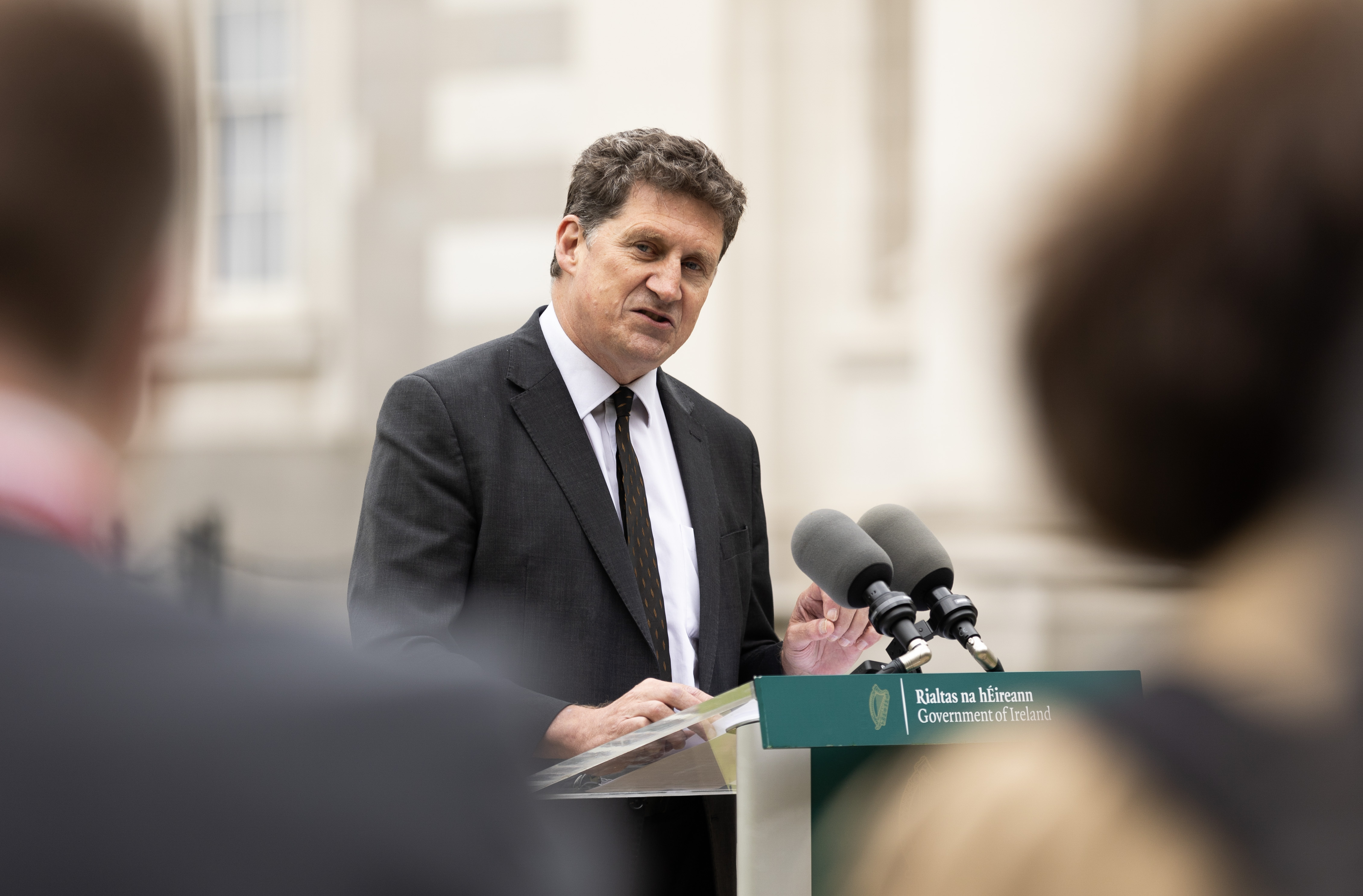 Eamon Ryan speaking from a podium